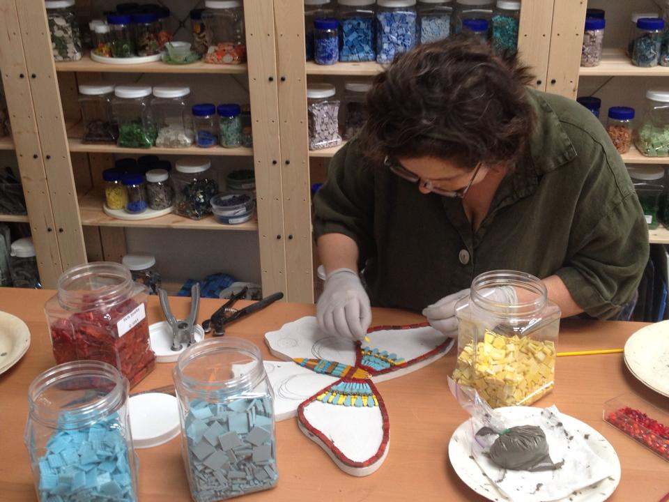 Irina Charny working on mosaic butterfly in her Costa Mesa studio